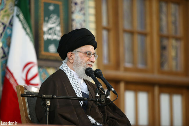 Ayatollah Khamenei addressing a large gathering of people at Imam Reza Shrine in Mashhad