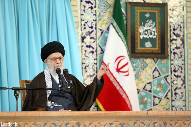 Ayatollah Khamenei addressing a large gathering of people at Imam Reza Shrine in Mashhad